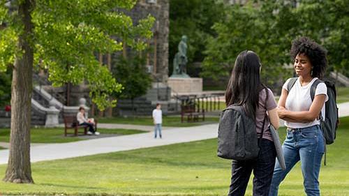 Students in the summer in front of Morrill Hall
